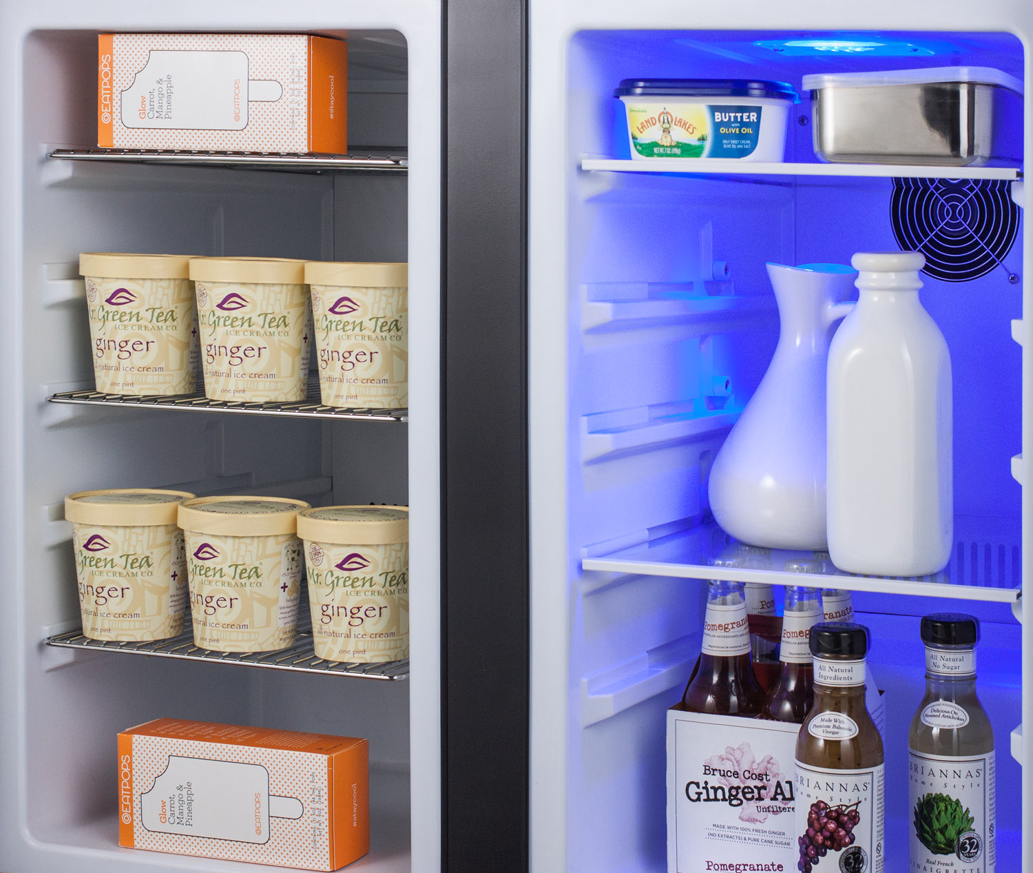 Commercially approved, frost-free, side-by-side refrigerator-freezer for built-in or freestanding use with two panel-ready doors, black cabinet, front-placed digital controls
